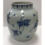A late 18th / early 19th Century Chinese blue and white vase decorated with floral sprays, 25.