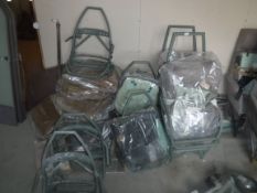 A collection of seven various aeroplane seat frames,