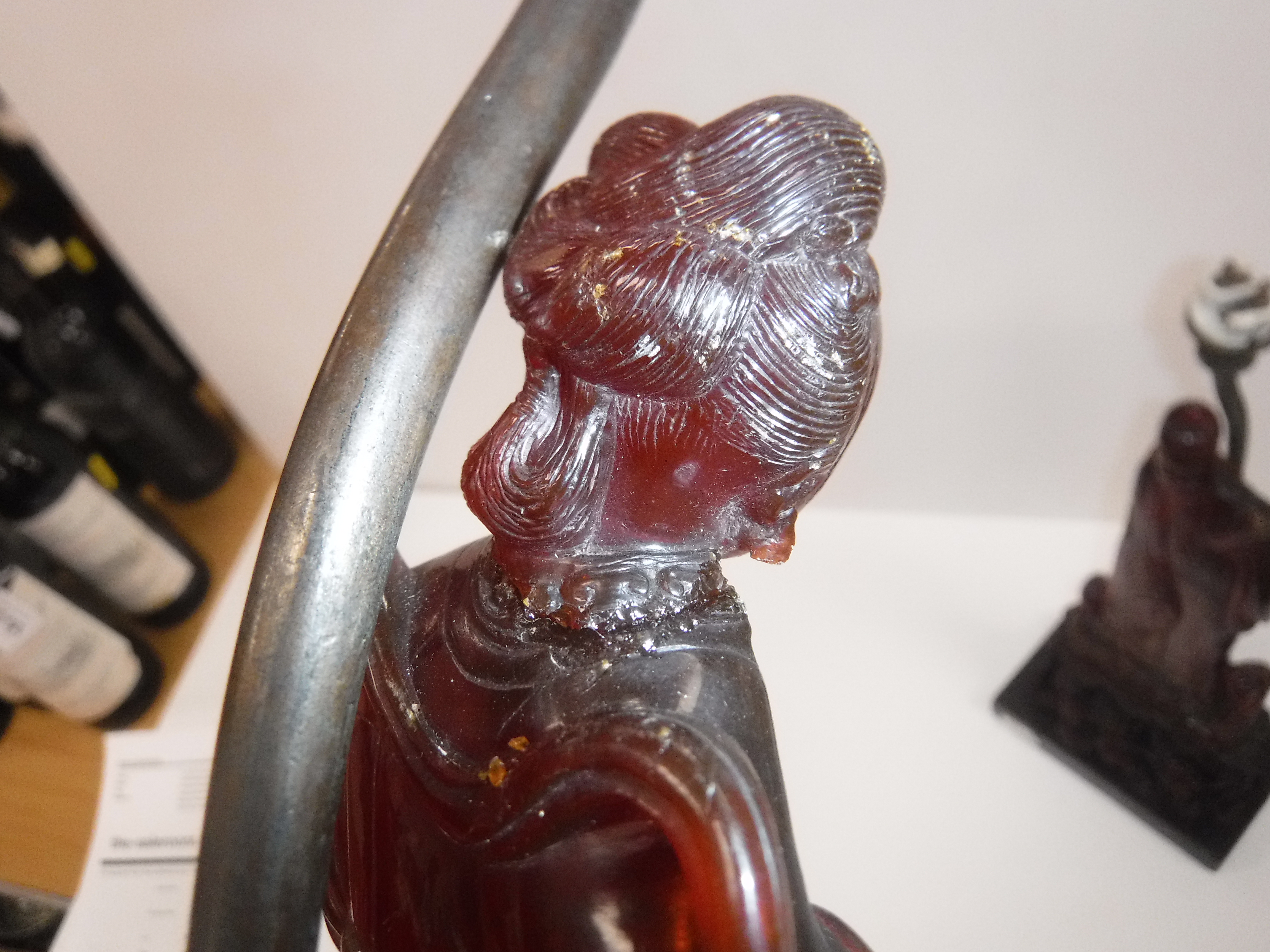 A pair of Chinese carved amber figures of a man and a woman in robes, - Image 22 of 27