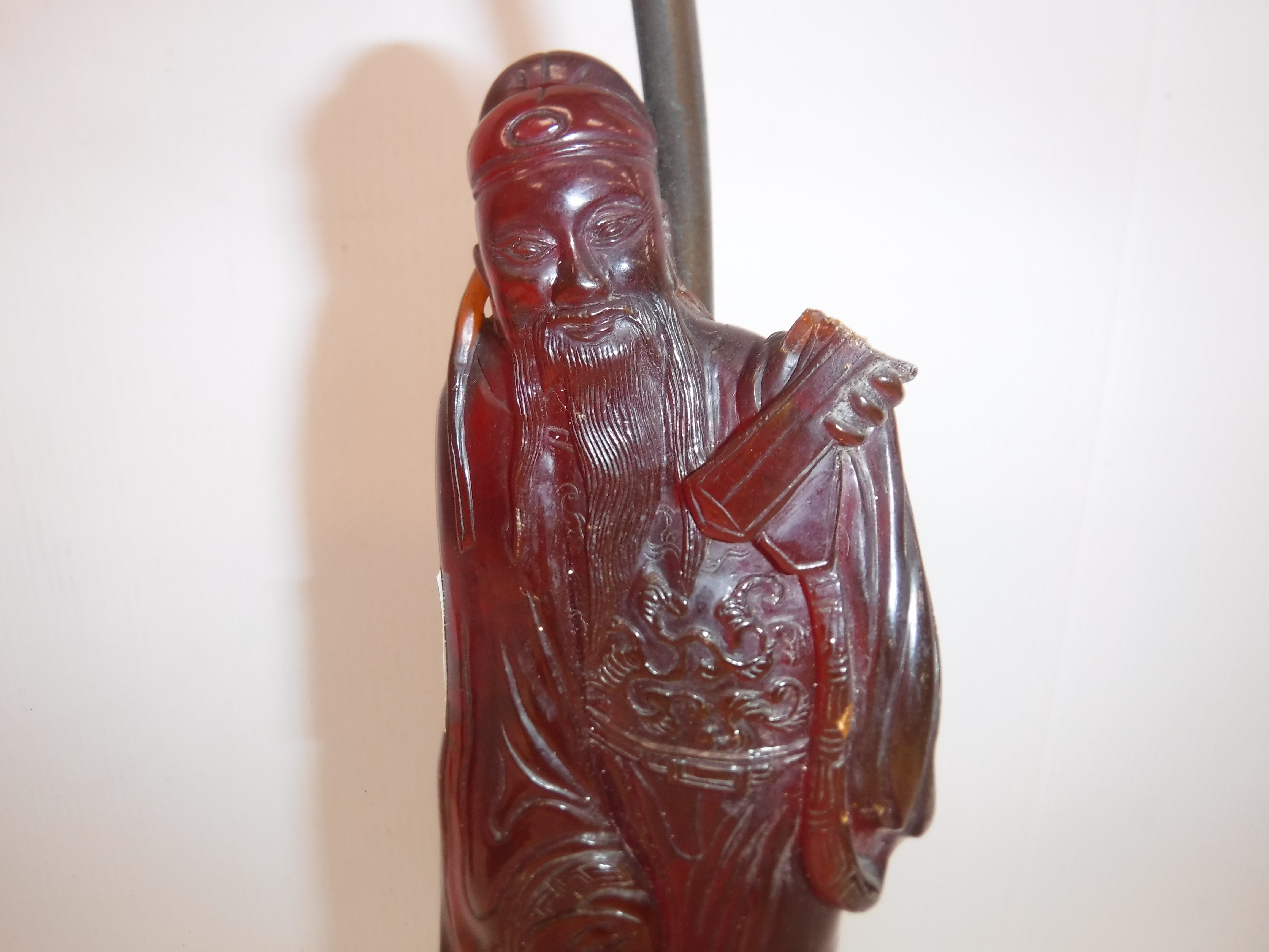 A pair of Chinese carved amber figures of a man and a woman in robes, - Image 5 of 27