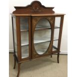 An Edwardian mahogany break front display cabinet,