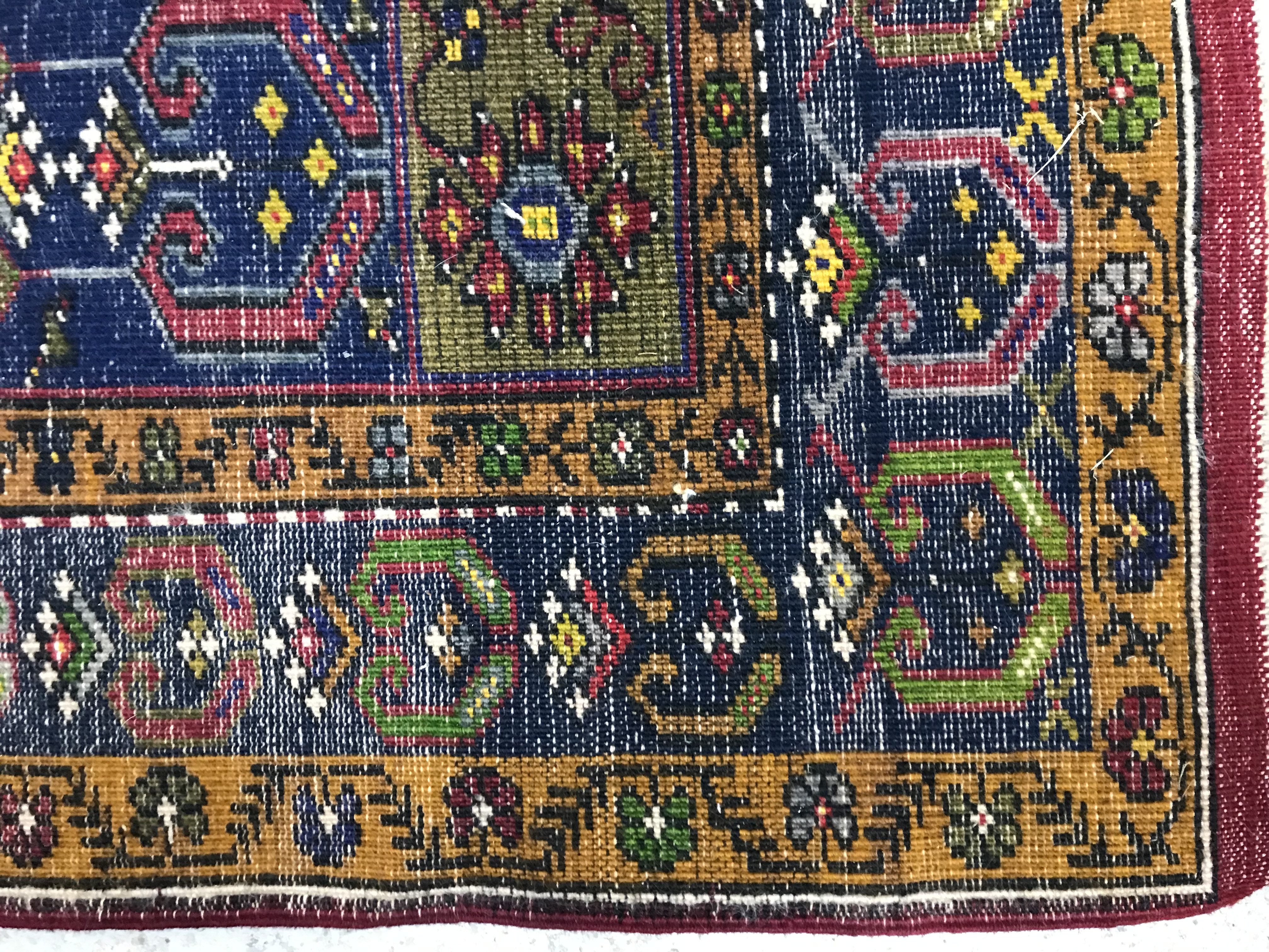 A Caucasian rug, the central panel set with lozenge shaped medallion on a red and blue ground, - Image 3 of 3