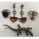 A collection of jewellery comprising a pair of silver and carnelian set earrings,