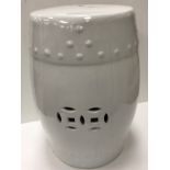 A modern Chinese white glazed barrel garden seat 47 cm high