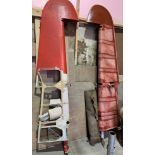 Two De Havilland tail fin elevators, red painted, approx 290 cm long,