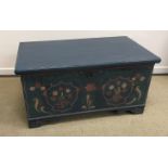 A 19th Century Eastern European marriage chest, petrol blue ground,