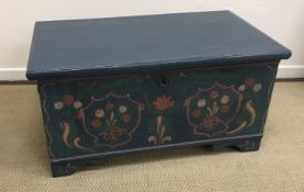 A 19th Century Eastern European marriage chest, petrol blue ground,