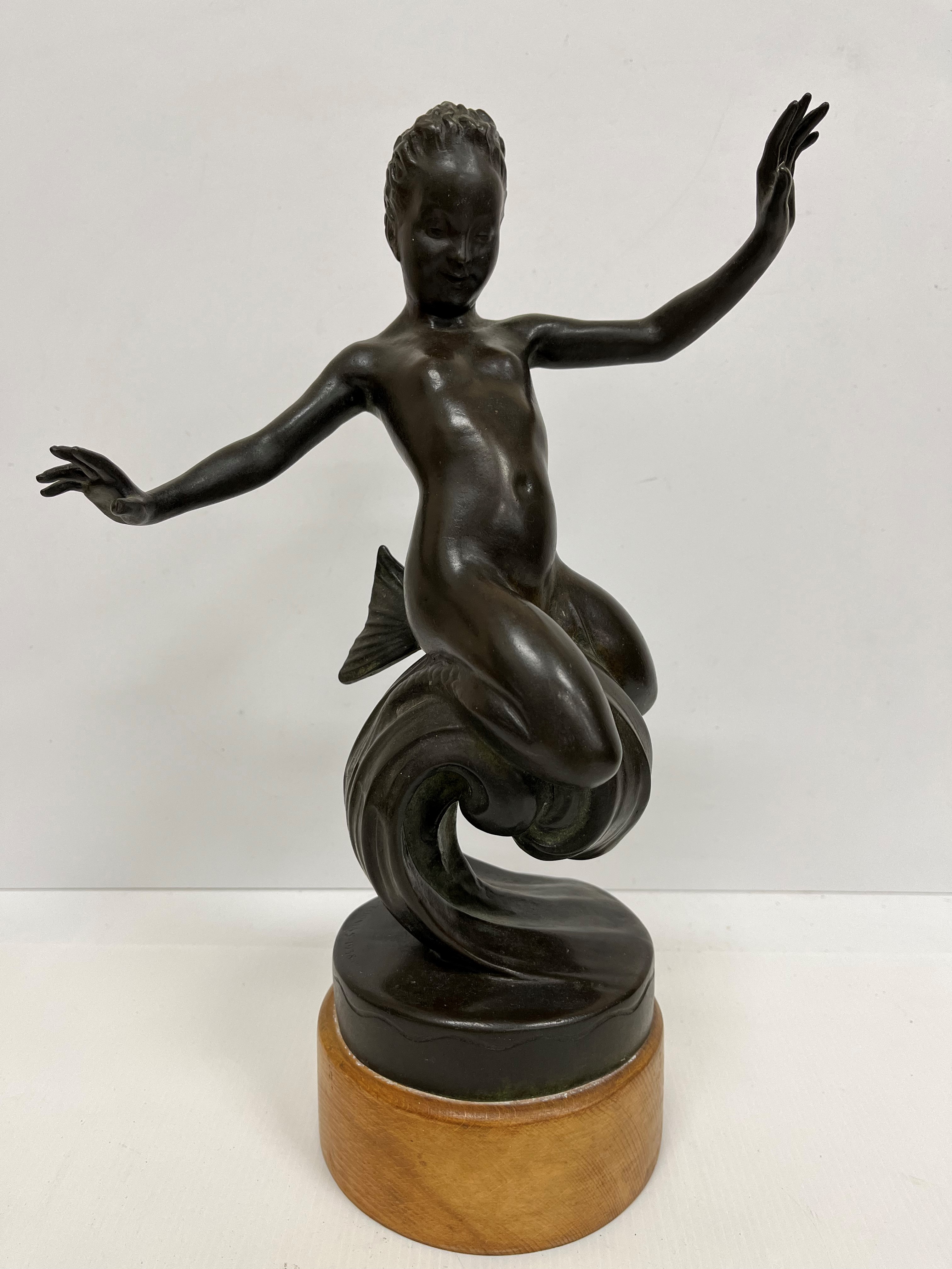 CECIL THOMAS (1885-1976) "Nymph of the wave", a chocolate patinated bronze study,