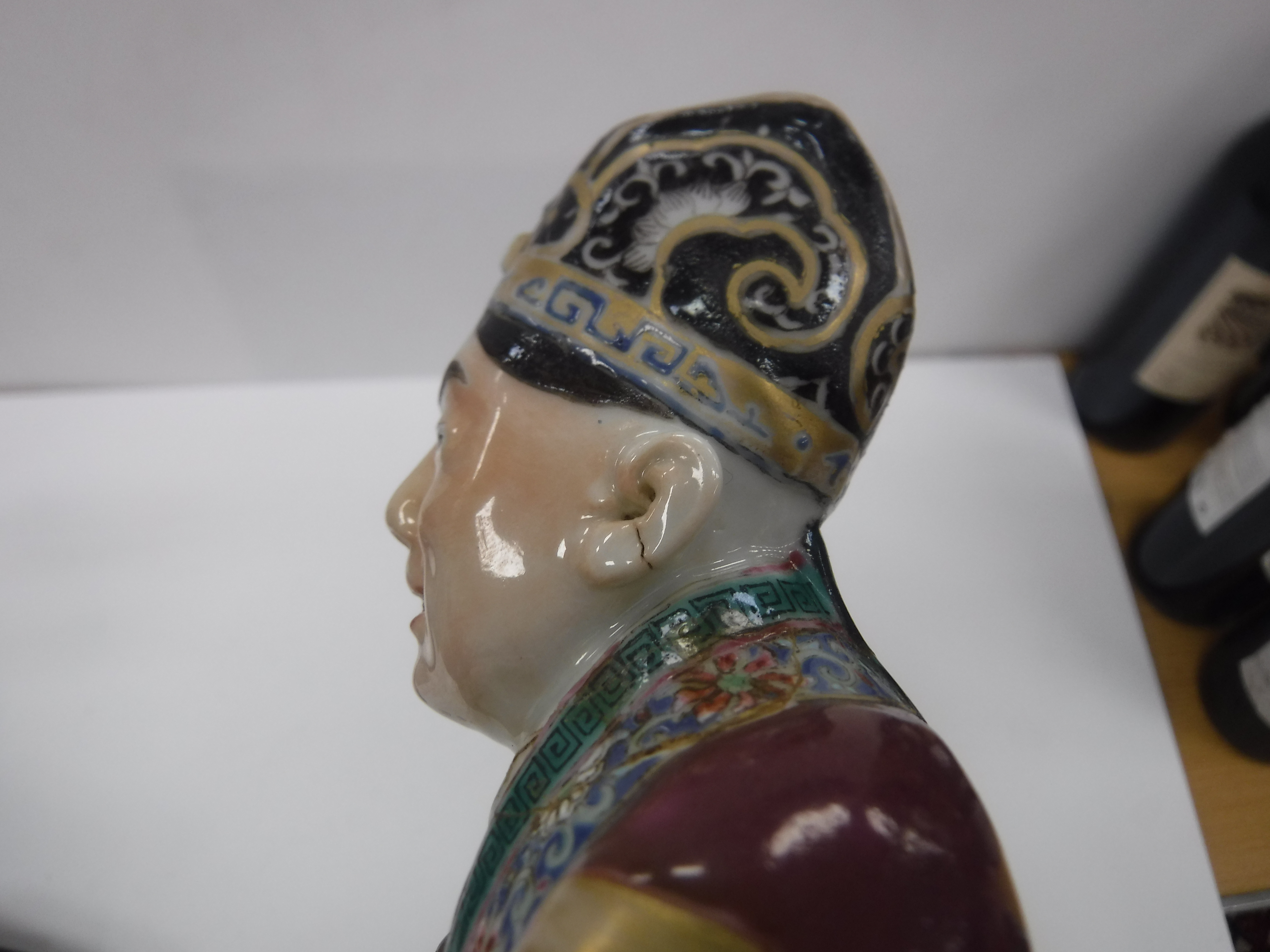 A set of three 19th Century Chinese polychrome decorated figures, one seated, one bearing sword, - Image 15 of 37