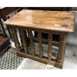 A 17th Century walnut table, the single piece top with moulded edge,