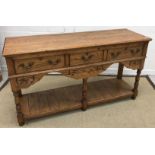 A modern oak dresser in the early 19th Century manner,