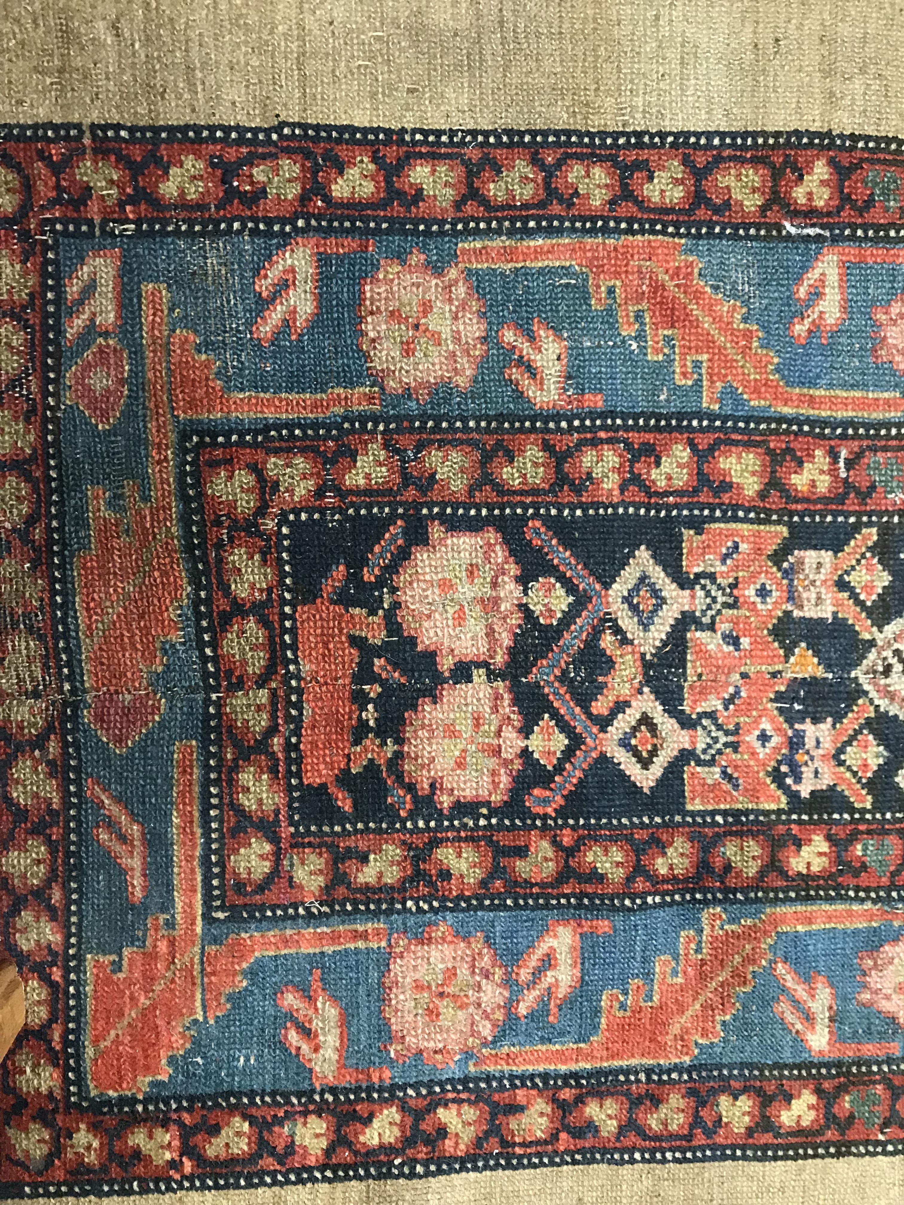 A Caucasian runner, the central panel set with elongated lozenge shaped medallion on a blue ground, - Image 3 of 10