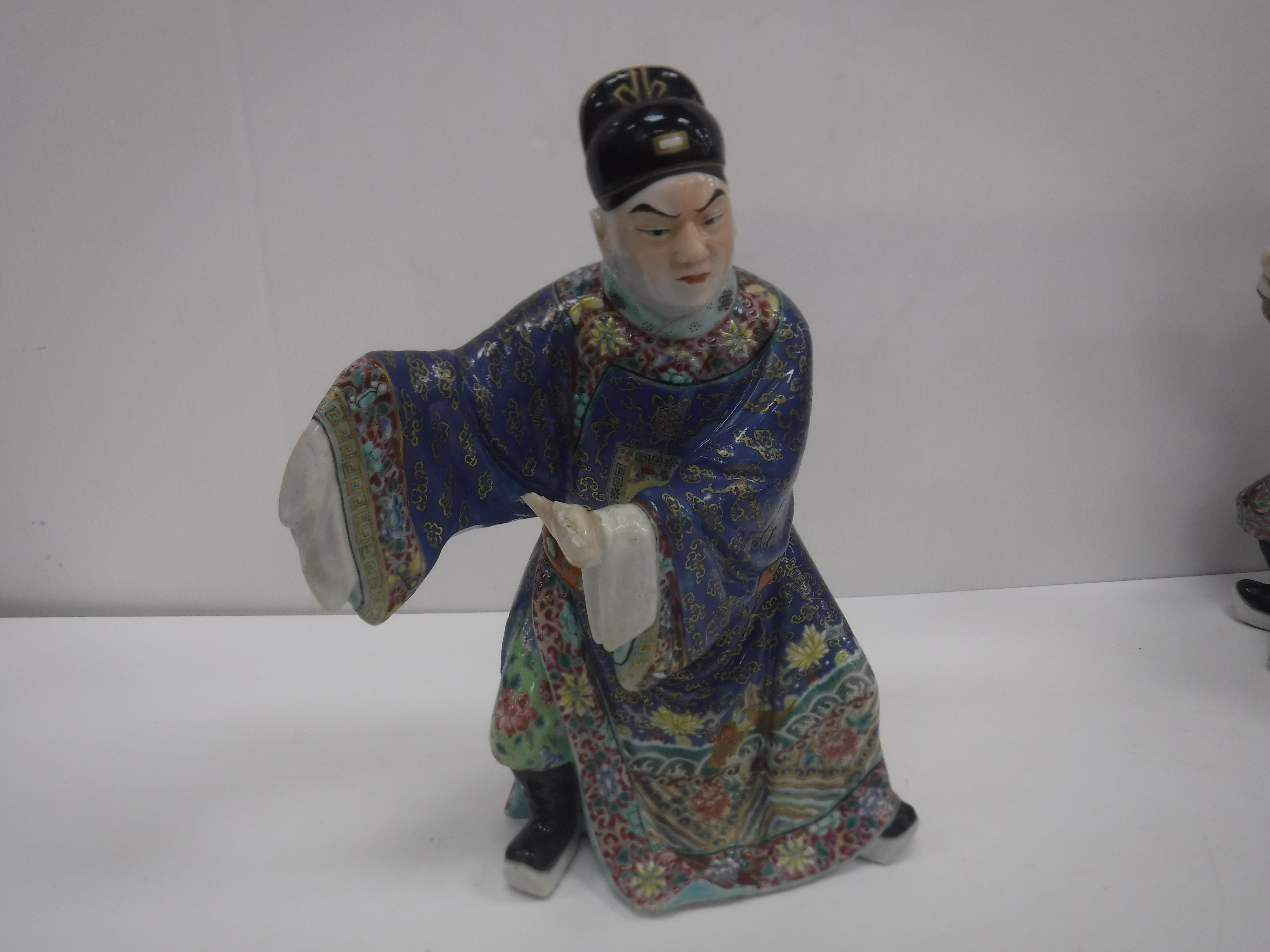 A set of three 19th Century Chinese polychrome decorated figures, one seated, one bearing sword, - Image 30 of 37