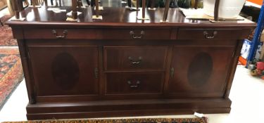 A modern mahogany dresser in the 19th Century manner,