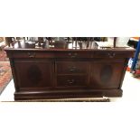 A modern mahogany dresser in the 19th Century manner,