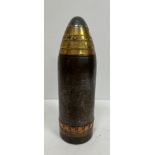 A World War I shell nose section inscribed "0F.13PRVFSBSF Co 10/16" 24 cm high x 7.