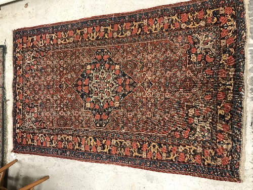 A vintage Persian carpet, - Image 2 of 5