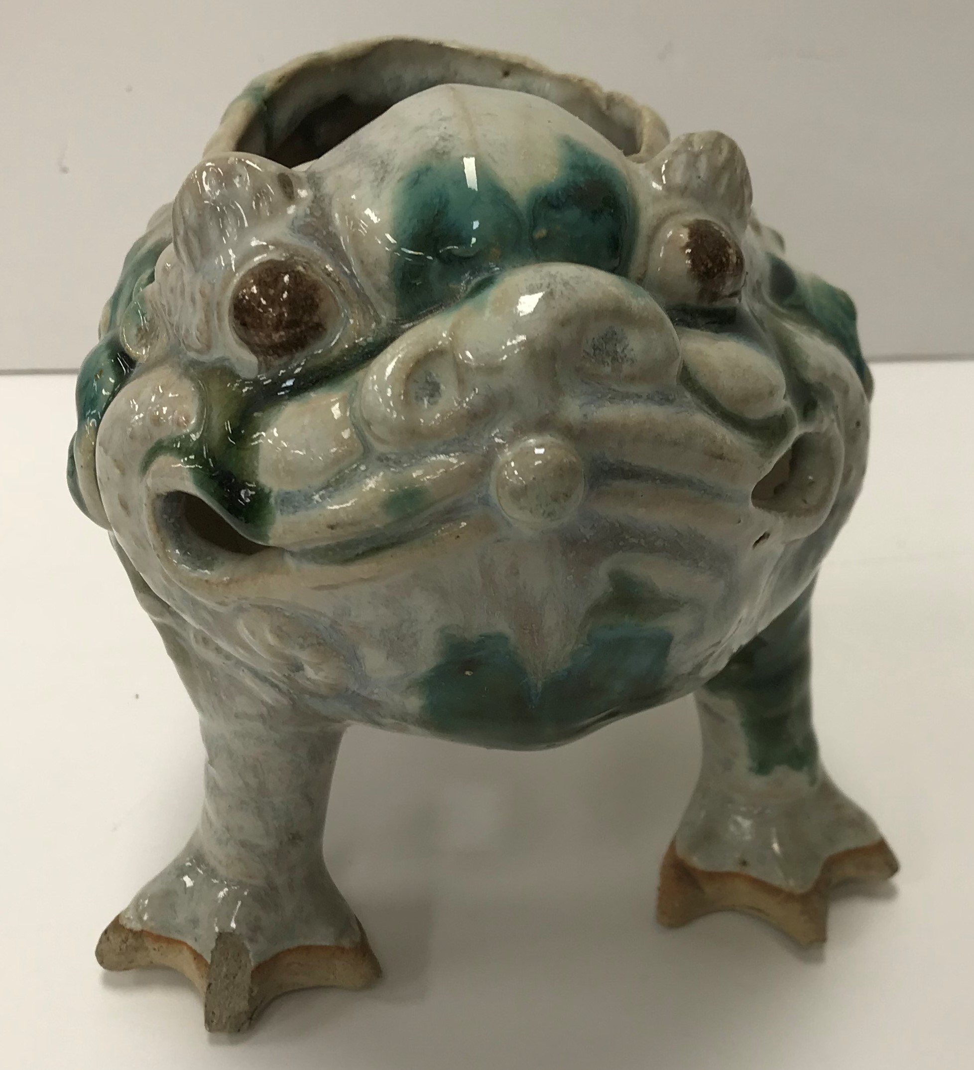 A 19th Century Chinese Shiwan Pottery green and cream slipped glazed pottery figure of "Jin Chan" a - Image 3 of 6