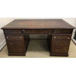 An early 20th Century mahogany double pedestal desk in the Georgian style,