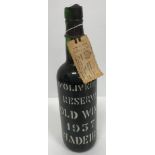 One bottle D'Olivieras Fine and Old Reserve Madeira wine 1957,