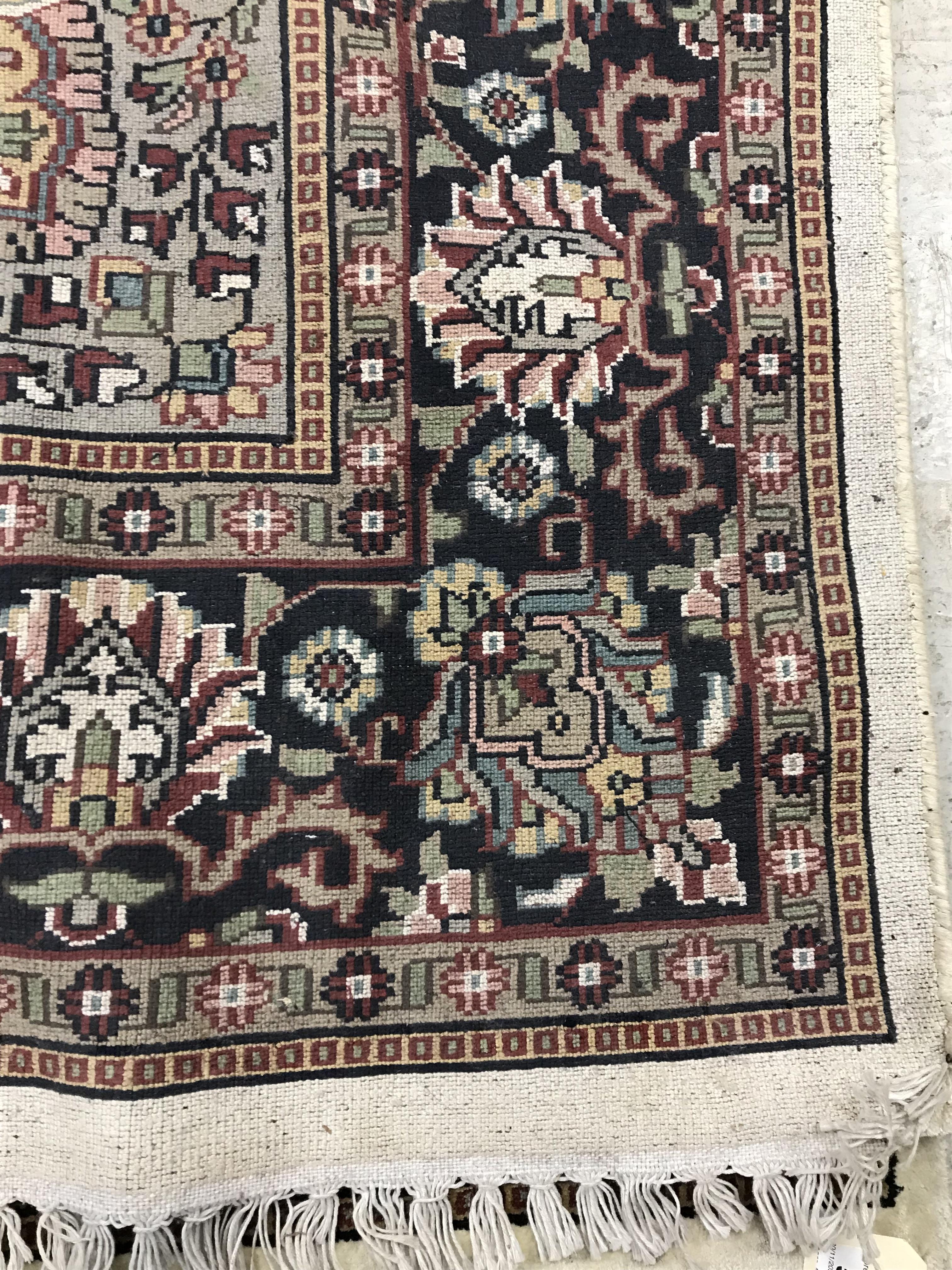 An Oriental carpet, - Image 6 of 9