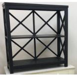 An Oka slate painted three tier open book shelf with X framed three quarter galleried decoration
