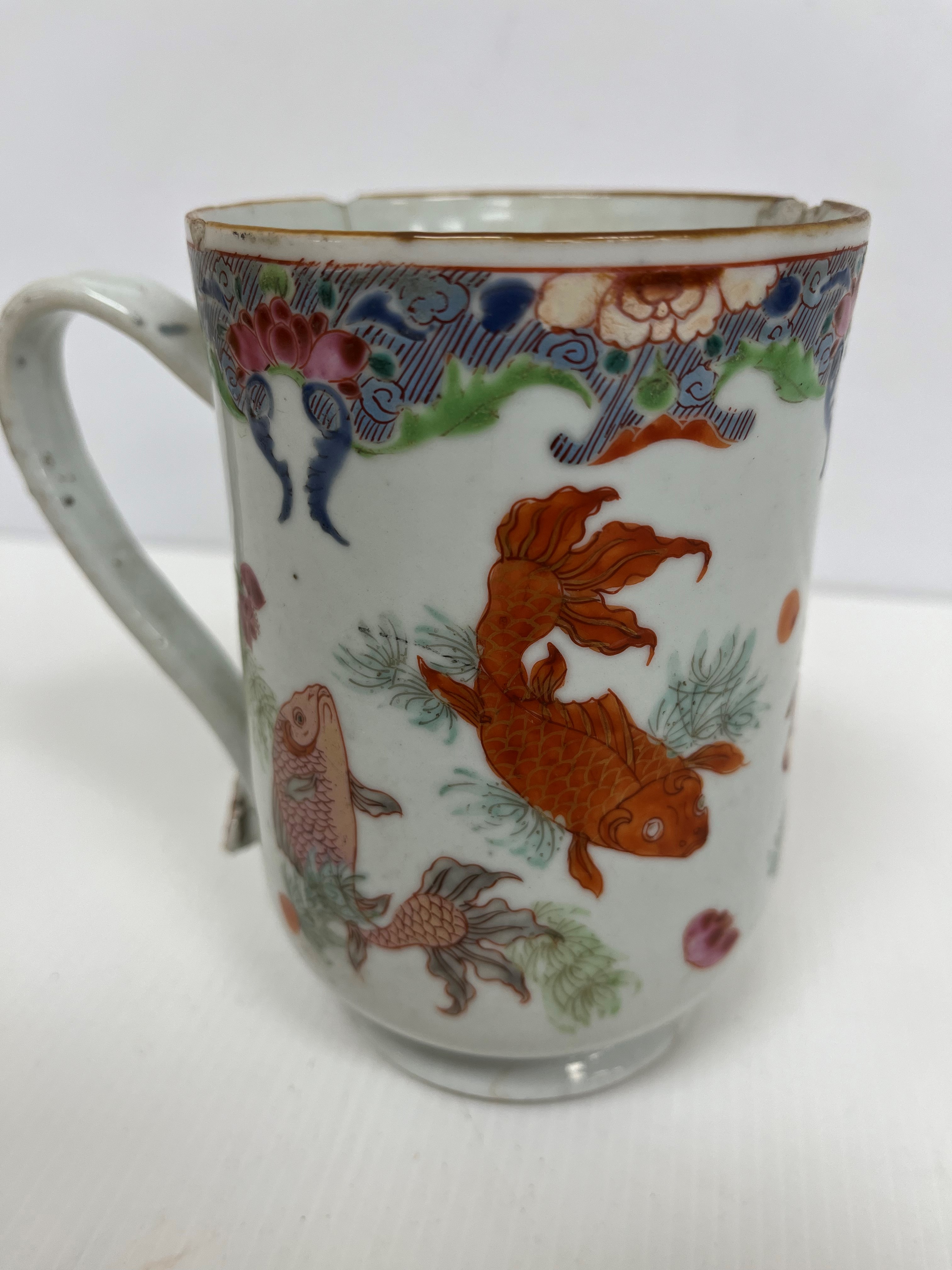 An 18th Century Chinese polychrome decorated mug of inverted bell form decorated with carp and - Image 2 of 2