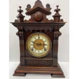 Three various oak cased mantle clocks