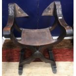 A 19th Century Spanish walnut framed Saravanola style X frame chair with leather back panel