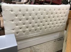 A modern cream buttoned upholstered headboard 212 cm wide x 132 cm high