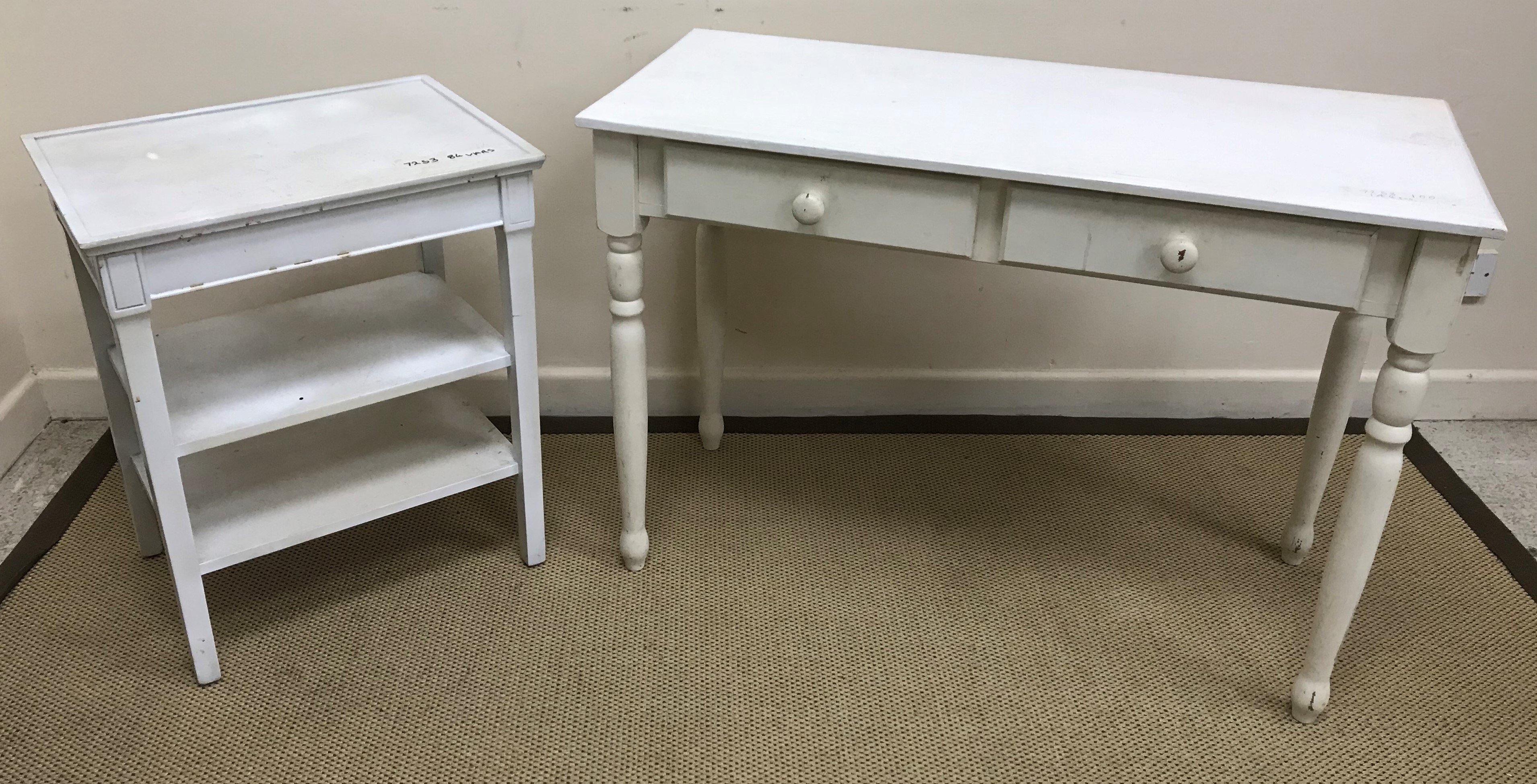 A modern white painted two drawer side table on turned legs 102 cm wide x 43 cm deep x 71.