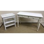 A modern white painted two drawer side table on turned legs 102 cm wide x 43 cm deep x 71.