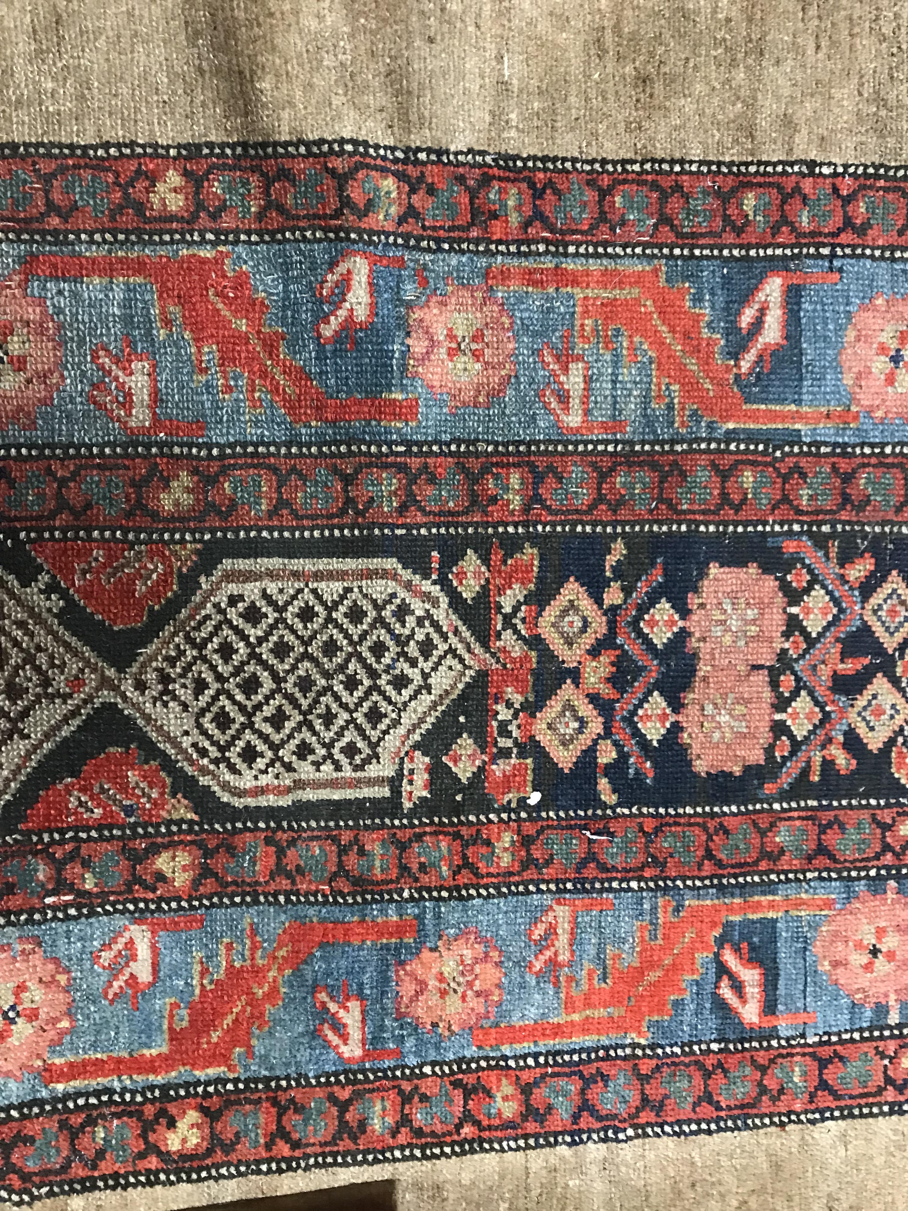 A Caucasian runner, the central panel set with elongated lozenge shaped medallion on a blue ground, - Image 6 of 10