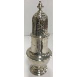 A George V silver sugar caster in the 18th Century manner (London 1818 by Charles Stewart Harris &