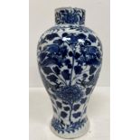 A 19th Century Chinese blue and white baluster shaped vase decorated with four toed dragons