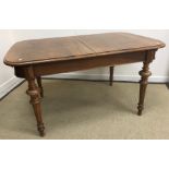 A late 19th Century Continental (possibly Swiss) rounded rectangular extending dining table,