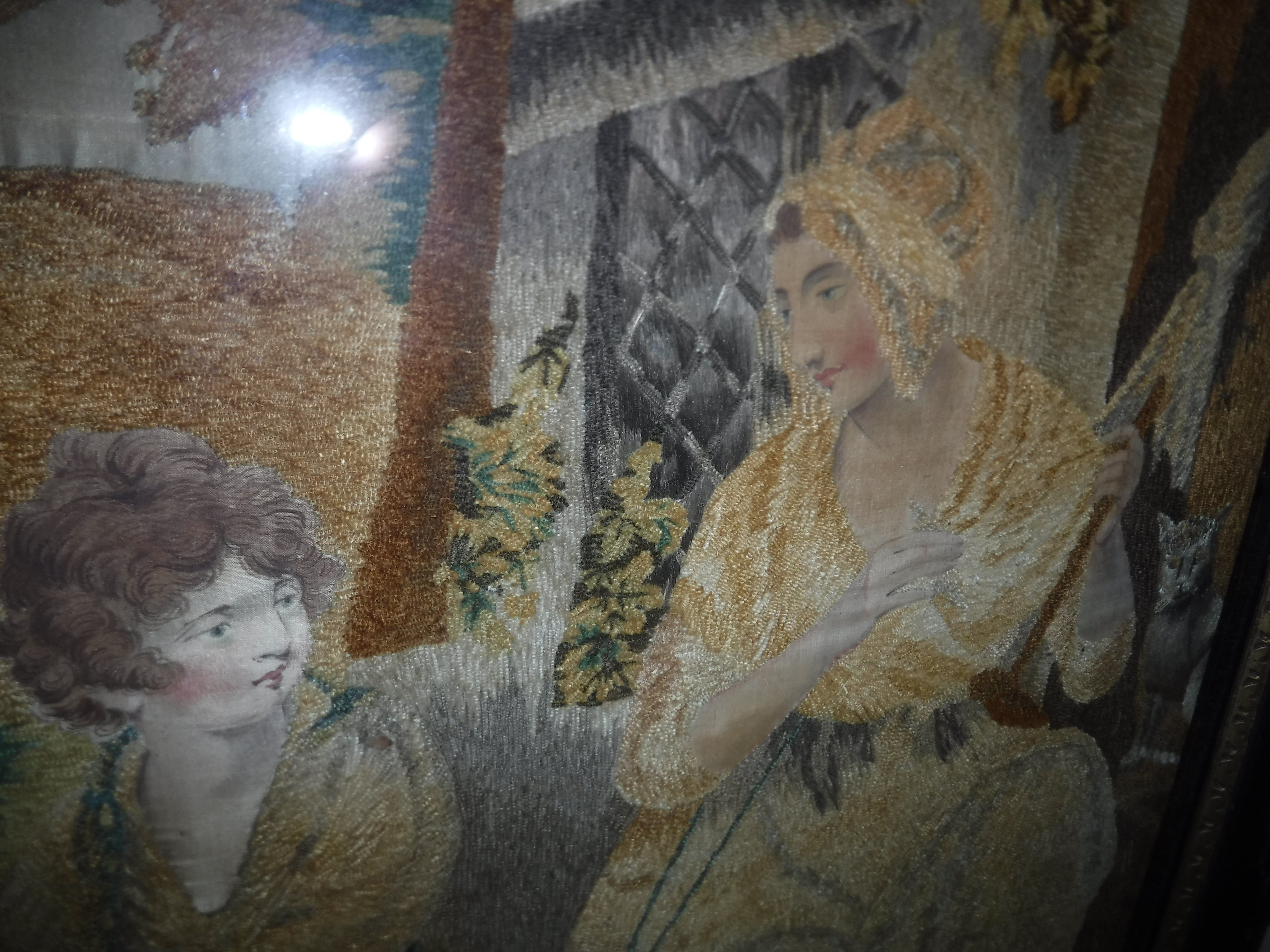 An early 19th Century needlework and printed silk study of a woman with shawl and young child - Image 8 of 13