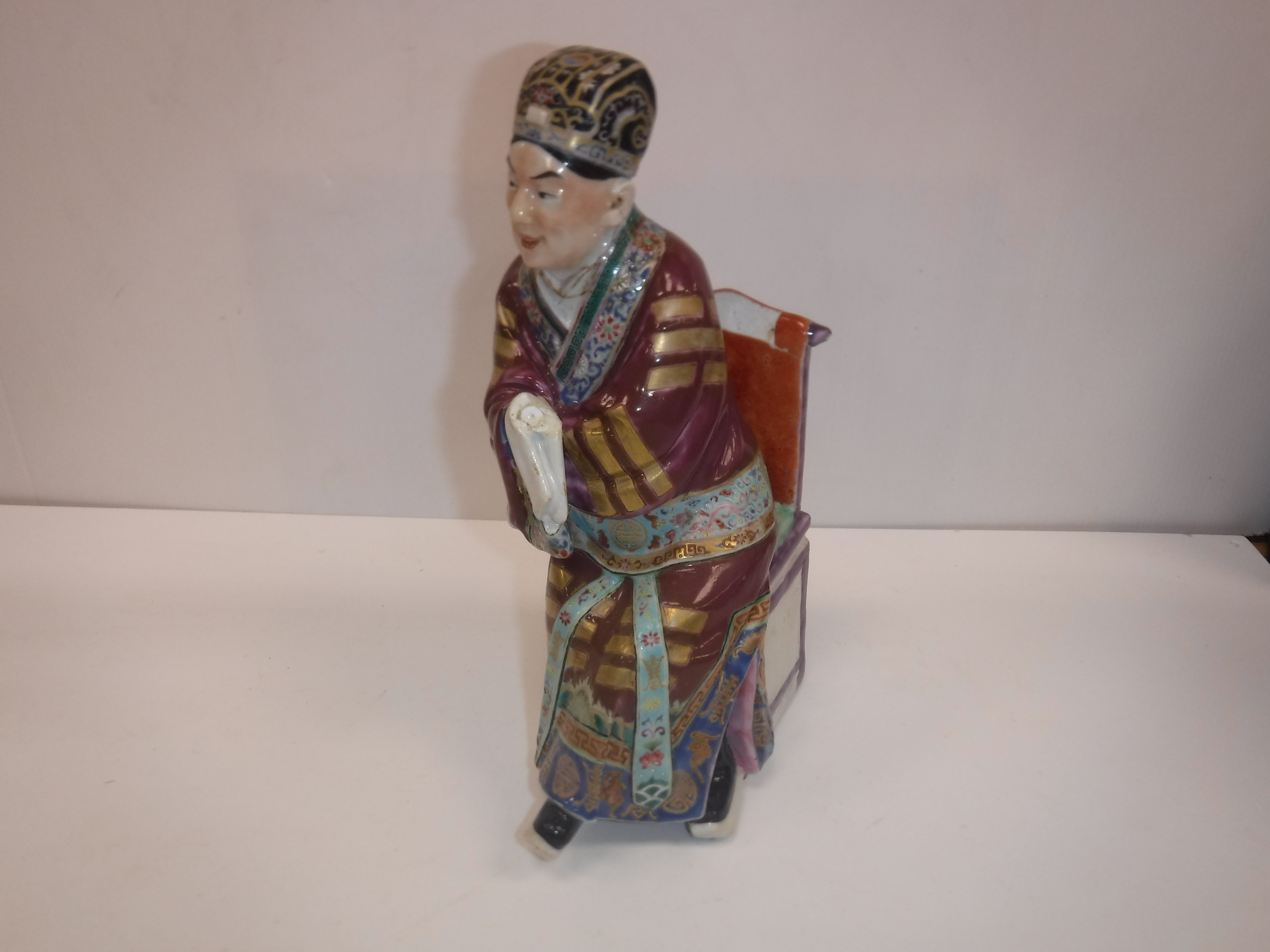 A set of three 19th Century Chinese polychrome decorated figures, one seated, one bearing sword, - Image 2 of 37