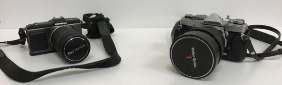 A collection of cameras and equipment to