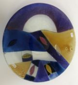 A modern decorative charger painted with