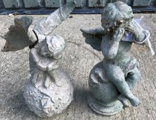 A cast metal figure of a cherub crying s