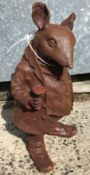 A cast metal figure of "Mr. Ratty", with