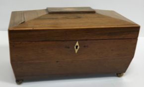 A 19th Century mahogany tea caddy of pla