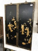 A pair of shibyama type panels, the blac