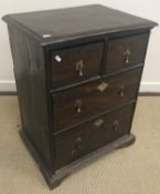 An 18th Century elm chest of drawers, th