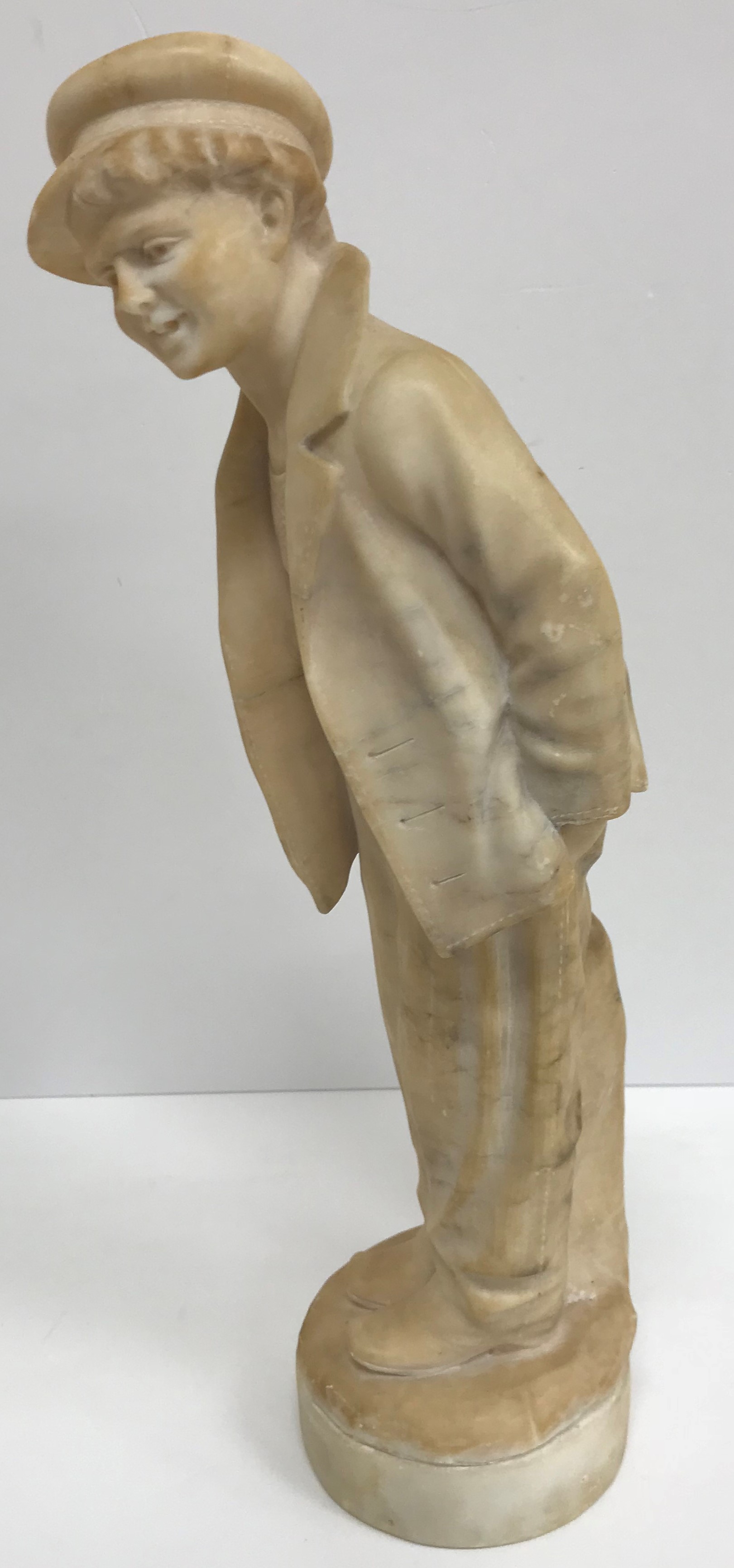 A carved alabaster figure of a young sai - Image 2 of 32