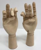Two wooden artist's model hands, with jo