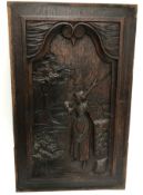 Two 19th Century Continental carved panels depicting "Woman with pitchfork", 50.