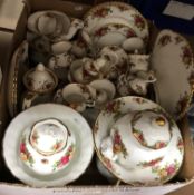 A box containing a large collection of Royal Albert "Old Country Roses" dinner wares, tea wares,