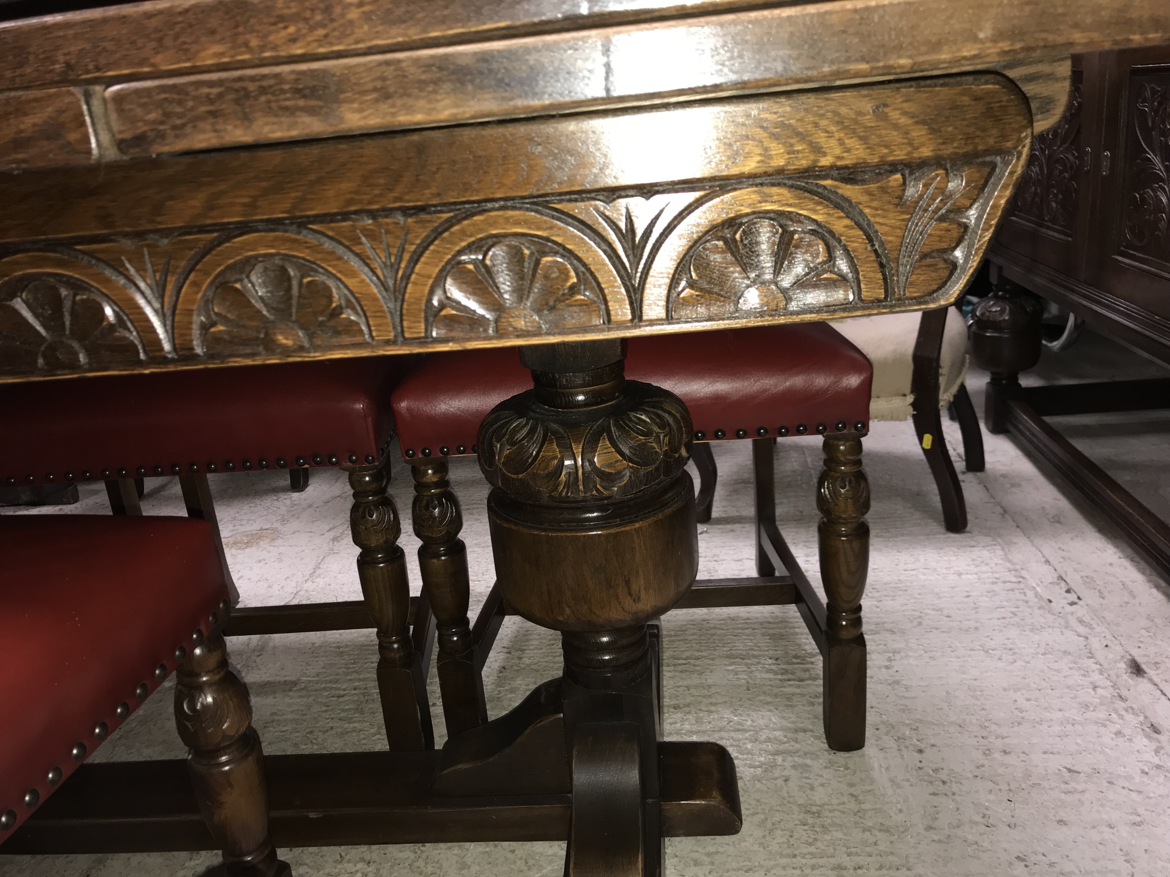 A Maple & Co oak dining room suite comprising carved oak drawer leaf table in the 17th Century - Image 5 of 5